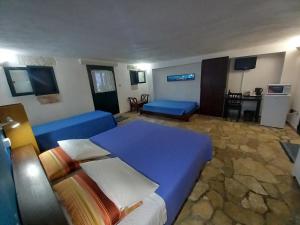 Postel nebo postele na pokoji v ubytování Breezes B&B + 37 fotografií