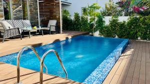 Bazén v ubytování Luxury Paradise Villa nebo v jeho okolí