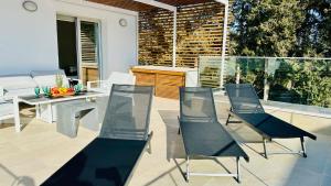 Posezení v ubytování Luxury Paradise Villa