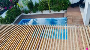 Bazén v ubytování Luxury Paradise Villa nebo v jeho okolí
