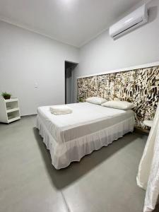 Postel nebo postele na pokoji v ubytování Pousada Balanço do Mar + 46 fotografií