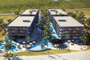 an aerial view of a resort with a swimming pool at Porto Alto Resort in Ipojuca +37 photos