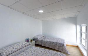 Katil atau katil-katil dalam bilik di Casa en Orihuela Costa y Torrevieja