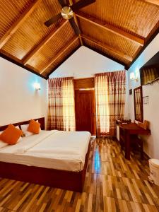 Postel nebo postele na pokoji v ubytování Sabba Beach Suite , Fodhdhoo - Maldives