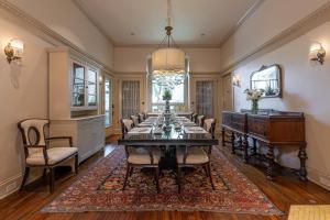 a large dining room with a long table and chairs at Stonehurst Place Bed & Breakfast in Atlanta