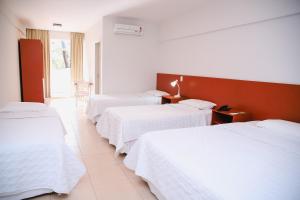 Katil atau katil-katil dalam bilik di Hotel Água Das Araras