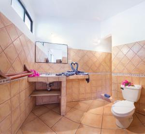 Ein Badezimmer in der Unterkunft Hotel Laguna del Cocodrilo