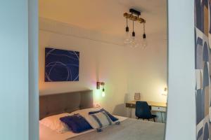 Łóżko lub łóżka w pokoju w obiekcie +NOUVEAU+ BINIC Port ET Plage