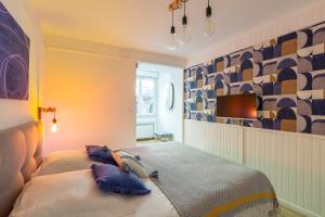 Posteľ alebo postele v izbe v ubytovaní +NOUVEAU+ BINIC Port ET Plage