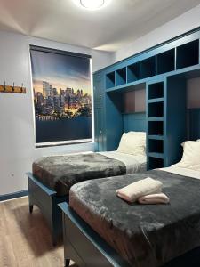 Postel nebo postele na pokoji v ubytování Essence hotel