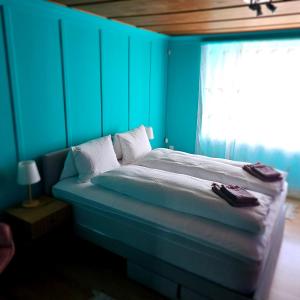 Ένα ή περισσότερα κρεβάτια σε δωμάτιο στο La Fattoria del Coz