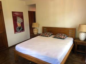 Llit o llits en una habitació de Between us : Chambres d’hôtes à Saint joseph