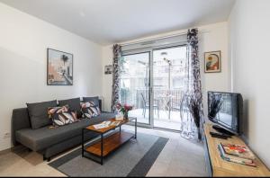 TV a/nebo společenská místnost v ubytování Appartement nice