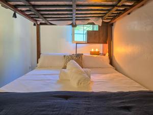 Letto o letti in una camera di Ti Kay Paradi T3 - Les pieds dans l'eau