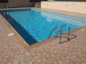 Kolam renang di atau dekat dengan Star Apt in front Nissi whit Sea View