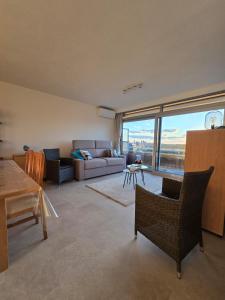 Posezení v ubytování Cosy apartment with sea view Residentie Astrid