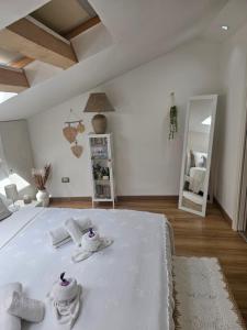 Postel nebo postele na pokoji v ubytování La mansarda suite