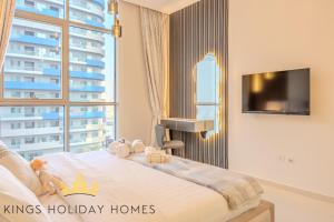 TV a/nebo společenská místnost v ubytování Royal suites Dunya tower Burj Khalifa St Kings