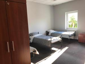 Postel nebo postele na pokoji v ubytování Hostel Iveda