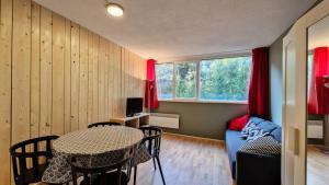 Μια τηλεόραση ή/και κέντρο ψυχαγωγίας στο Résidence Andromede - Studio confortable · Proche des pistes MAE-7416