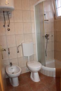 Ένα μπάνιο στο Apartman Blue Cross