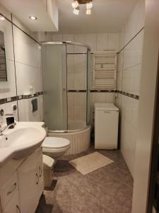 Ένα μπάνιο στο Przytulny Apartament w Śródmieściu +3 φωτογραφίες