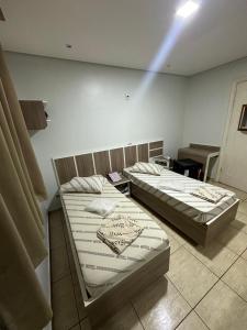 Postel nebo postele na pokoji v ubytování Hotel Maraja 9 de julho