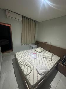 Postel nebo postele na pokoji v ubytování Hotel Maraja 9 de julho