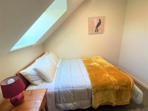 Postel nebo postele na pokoji v ubytování Calm Swan Villa