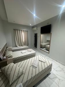 Postel nebo postele na pokoji v ubytování Hotel Maraja 9 de julho