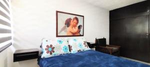 Postel nebo postele na pokoji v ubytování Habitación cerca Parque Simón Bolívar Aeropuerto Movistar Arena + 6 fotografií