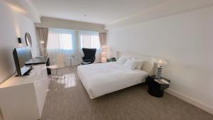 TV a/nebo společenská místnost v ubytování Oxford Palace Hotel