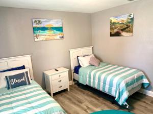 Ein Bett oder Betten in einem Zimmer der Unterkunft Getaway Clubhouse