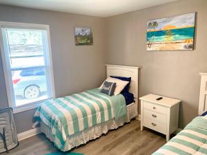 Ein Bett oder Betten in einem Zimmer der Unterkunft Getaway Clubhouse
