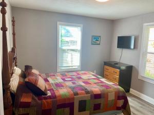 Ein Bett oder Betten in einem Zimmer der Unterkunft Getaway Clubhouse
