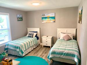Ein Bett oder Betten in einem Zimmer der Unterkunft Getaway Clubhouse