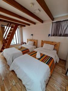 Letto o letti in una camera di Quito Basecamp - Adventure Hostel