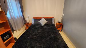 Ein Bett oder Betten in einem Zimmer der Unterkunft Piedra Negra Boutique Hotel