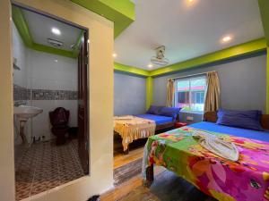 Postel nebo postele na pokoji v ubytování Villa Koh Rong