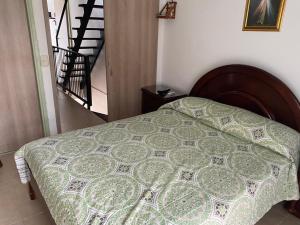 Giường trong phòng chung tại Descanso y sol