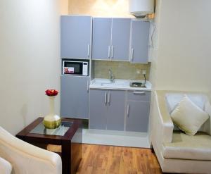 Kuchyň nebo kuchyňský kout v ubytování شقق قصر الابريز للشقق المخدومة