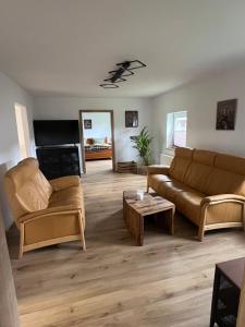 Posezení v ubytování Ferienhaus unterm Kohnstein