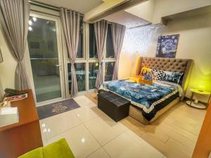 EG Private House -BGC UPTOWN客房内的一张或多张床位