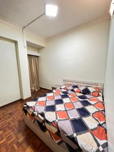 Ένα ή περισσότερα κρεβάτια σε δωμάτιο στο Azzalea 3-Bedroom Apartment Cameron Highlands