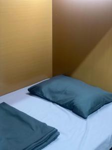 Rúm í herbergi á Hanoi New Comb Hostel