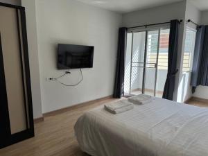 Postel nebo postele na pokoji v ubytování Pipp Residence