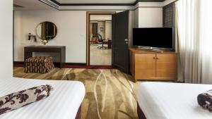 TV a/nebo společenská místnost v ubytování Rembrandt Residences Bangkok