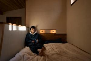 Ein Bett oder Betten in einem Zimmer der Unterkunft ist - Aokinodaira Field