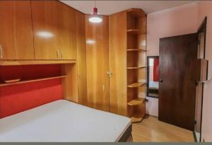 Ένα ή περισσότερα κρεβάτια σε δωμάτιο στο Casa mobiliada, ampla e arejada