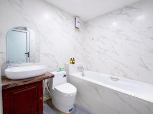 Koupelna v ubytování Vientiane Ruby Villa Hotel